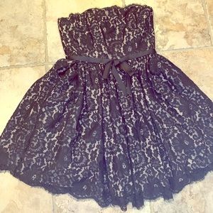 Neiman Marcus black lace strapless dress.